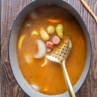 the crawfish boil base is simmered and ready for the crawfish