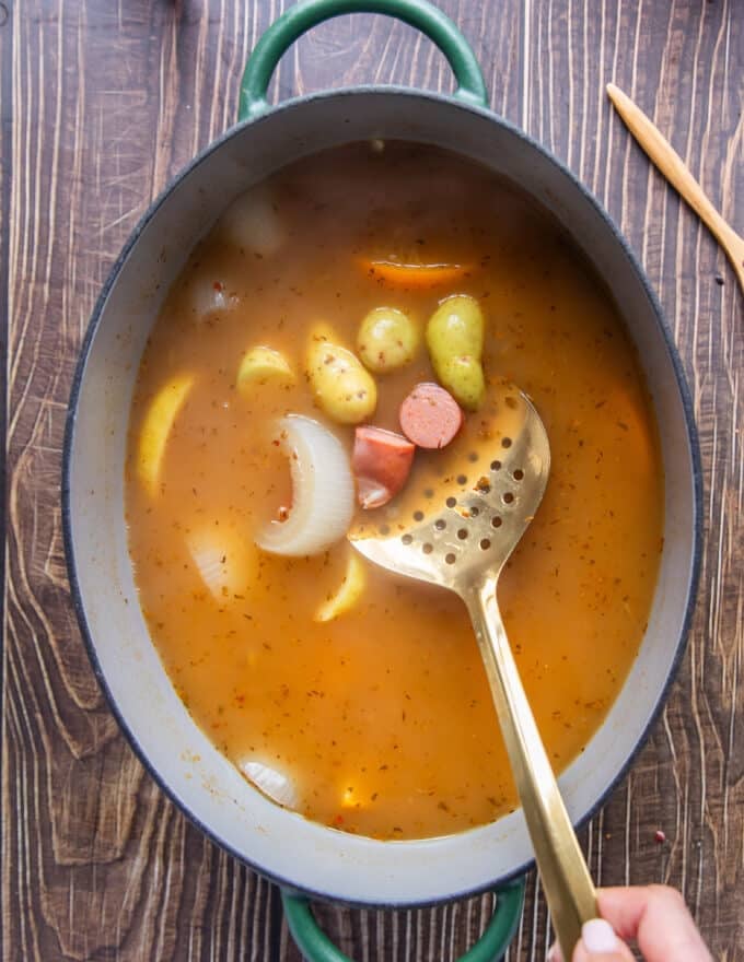 the crawfish boil base is simmered and ready for the crawfish