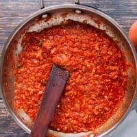 The tomato based sauce has simmer with the spices and ready for the black beans
