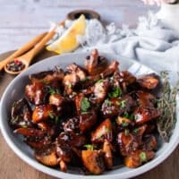 steakhouse mushrooms with parsley on a serving plate