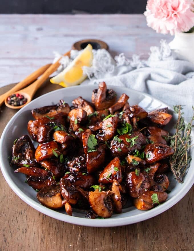 steakhouse mushrooms with parsley on a serving plate