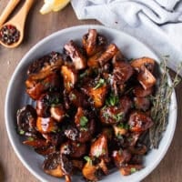 A plate of steakhouse mushrooms