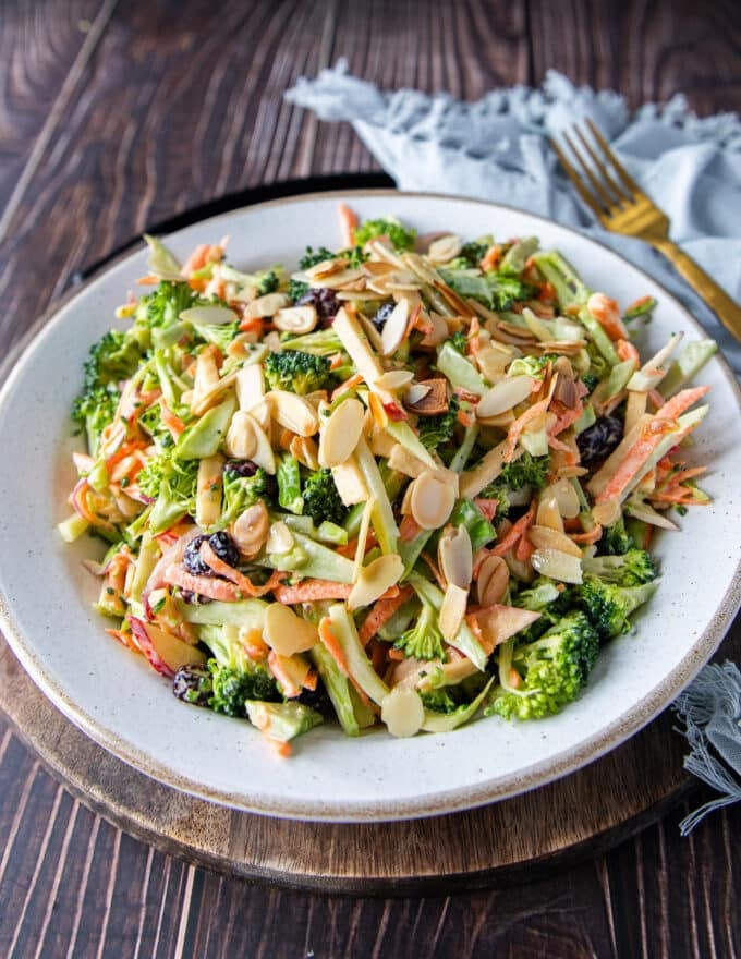plated easy broccoli slaw on a wooden board 