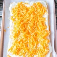 layer of cheese added over the ranch at the bottom of the slider bread