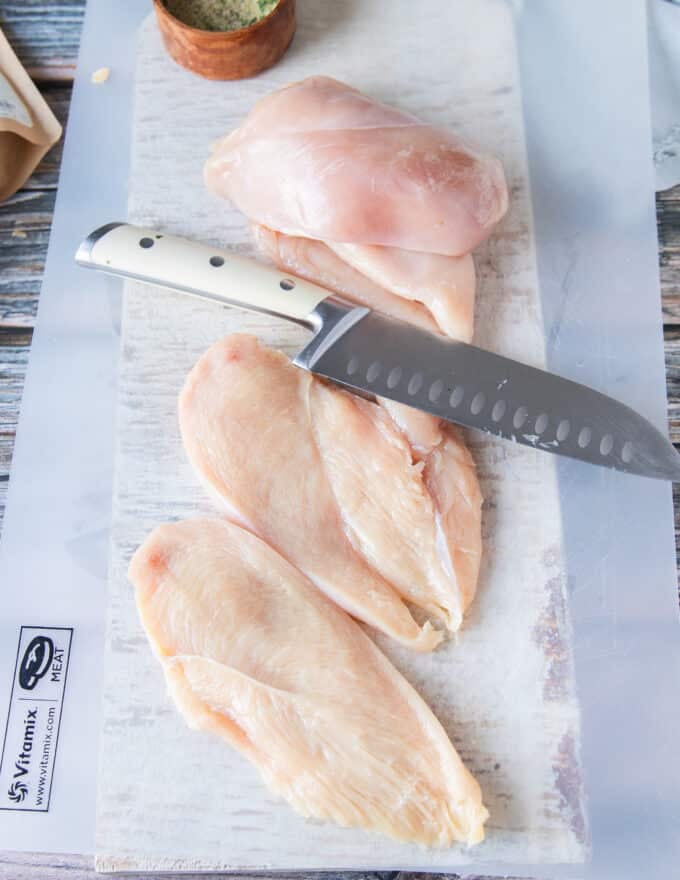 chicken breasts sliced in half to cook 