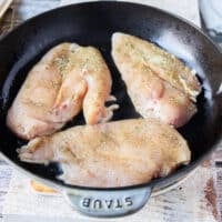 cooking the chicken in a cast iron from scratch to make chicken sliders if you don't have rotisserie