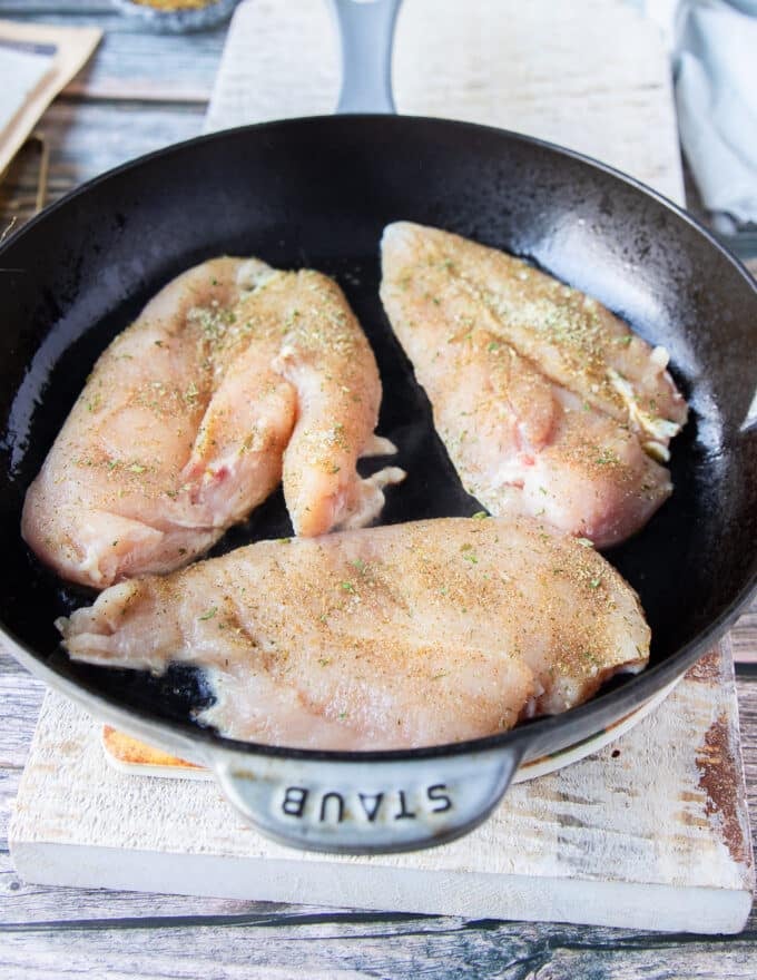 cooking the chicken in a cast iron from scratch to make chicken sliders if you don't have rotisserie