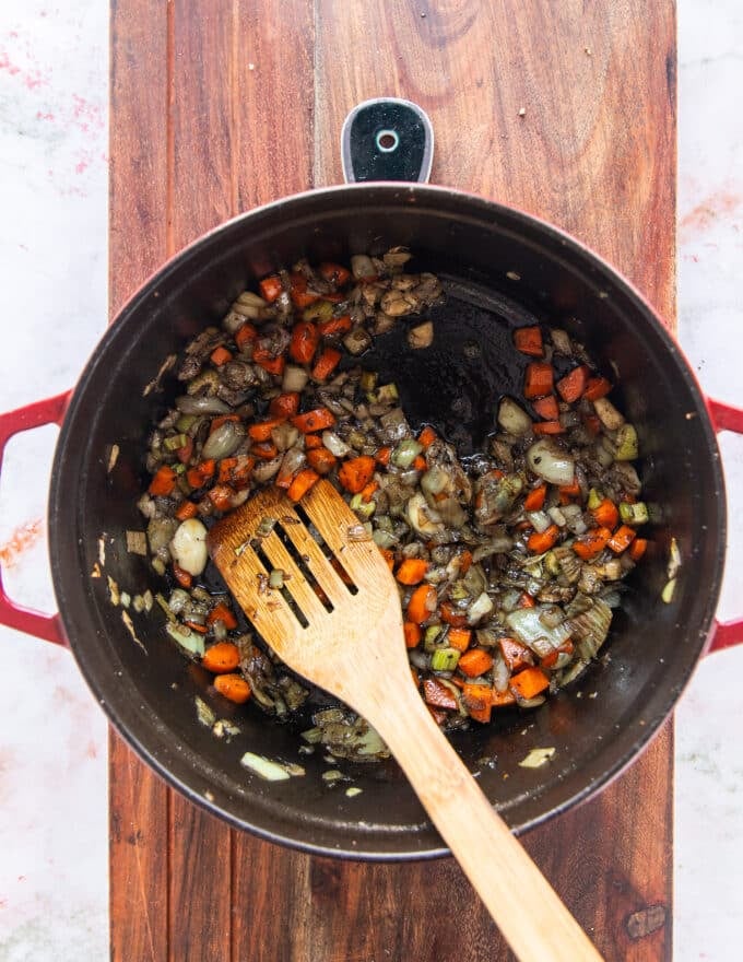 aromatics sautéed in the same dutch oven until soft and golden