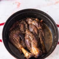 slow cooked lamb shanks that are fork tender and fall off the bone