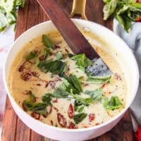 fresh basil is added ad the end of the creamy sun dried tomato sauce with parmesan