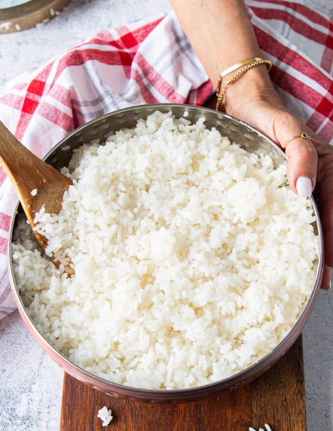 seasoned and folded sushi rice cooling in a bowl