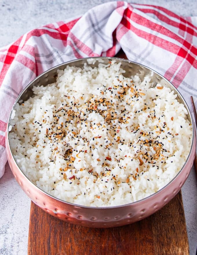 seasoned sushi rice in a bowl toped with furikake with perfect texture