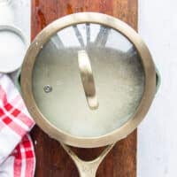covered pot of sushi rice to finish steaming