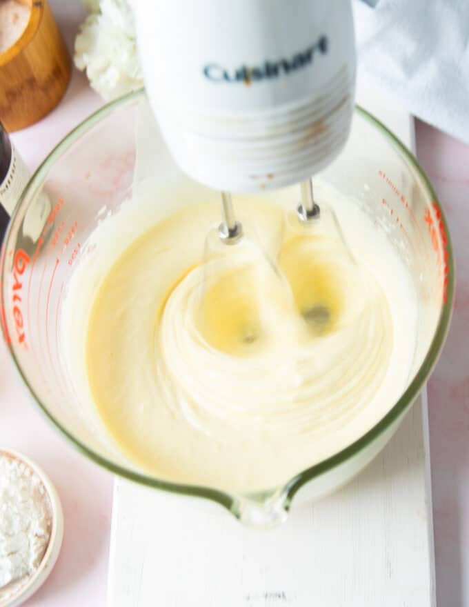 pale and light eggs and sugar beaten together until aerated 