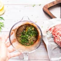 the marinade ingredients added to the bowl of onion water