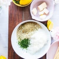 bread crumbs ingredients in a bowl with seasoning, herbs, lemon zest and parmesan cheese