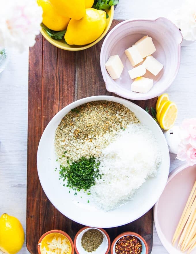 bread crumbs ingredients in a bowl with seasoning, herbs, lemon zest and parmesan cheese