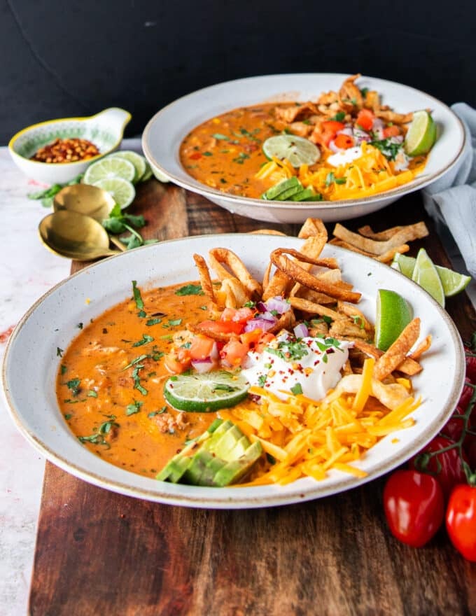 side view of a bowl of chicken taco soup made so creamy and hearty