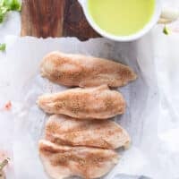 the chicken breasts are cut in half and seasoned to start the chicken taco soup from scratch