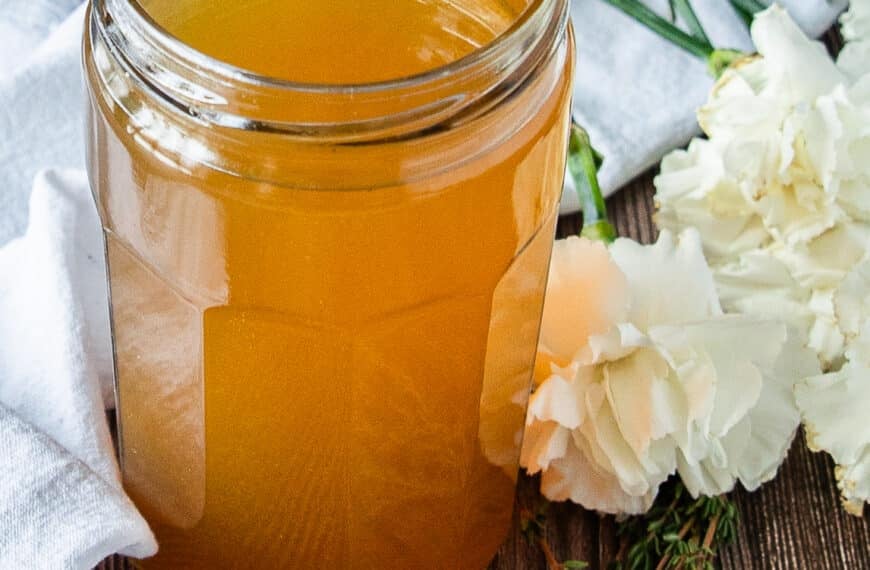 Perfectly cooled crab stock in a mason jar ready to store