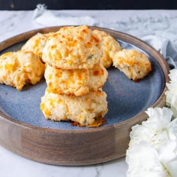 stacks of drop biscuits showing the fluffy texture