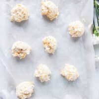 drop biscuits dropped on a baking sheet lined with parchment paper ready to go into the oven