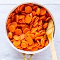 partially cooked carrots ready for the maple glaze