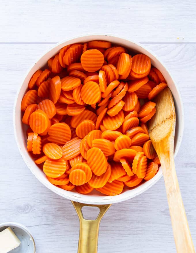 partially cooked carrots ready for the maple glaze
