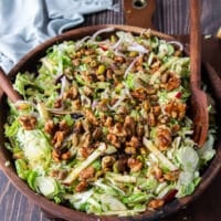 Candied walnuts added after the salad is tossed well so it remains crunchy