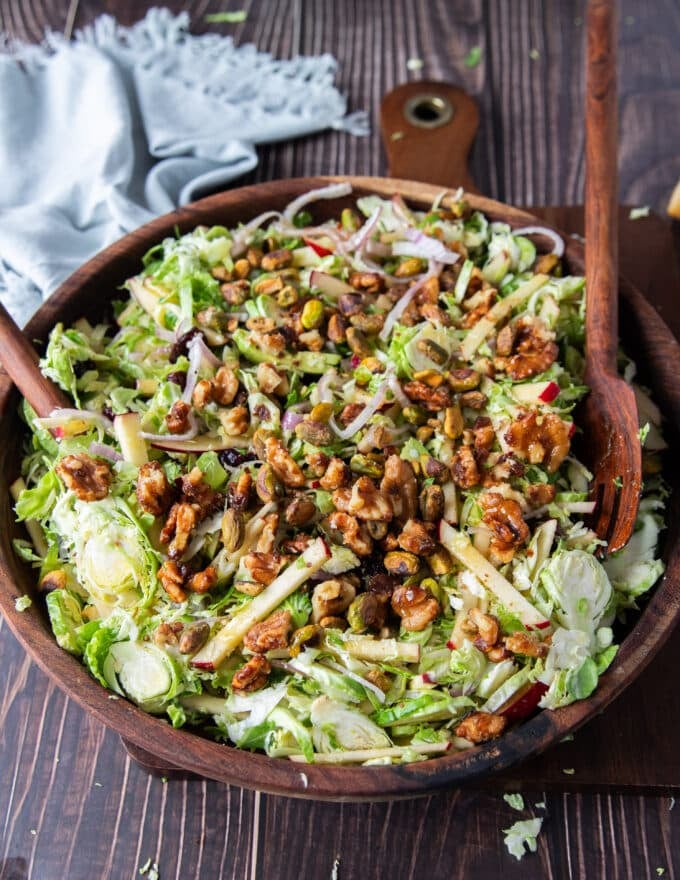 Candied walnuts added after the salad is tossed well so it remains crunchy