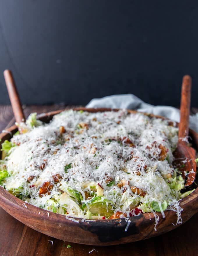 close up side view of a large bowl of brussel sprout salad
