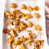 Cauliflower baked and out of the oven ready for the second coating.