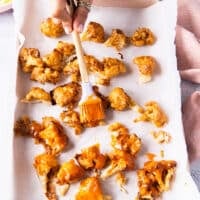 A brush used to brush the buffalo sauce mixture over the crisp cauliflower that's out of the oven.
