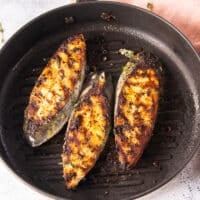 Perfect king mackerel steaks on the grill with crispy skin and brown grill marks