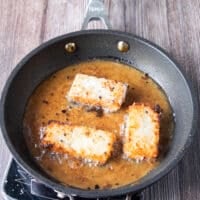 golden brown crispy rice pan frying in avocado oil
