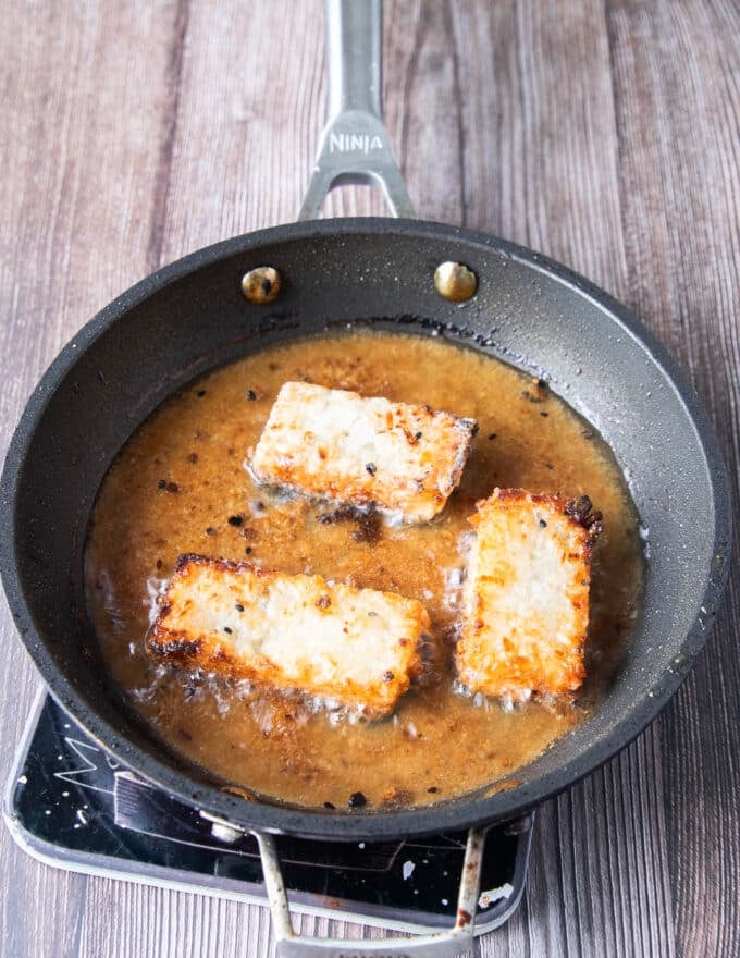 golden brown crispy rice pan frying in avocado oil 
