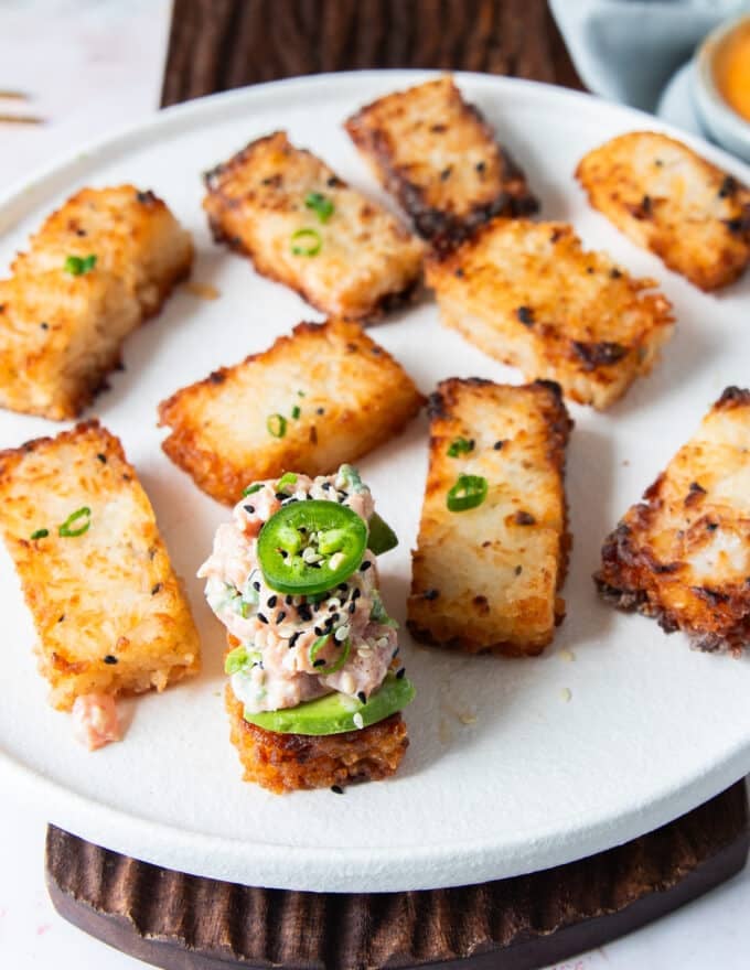 Copycat nobu spicy tuna crispy rice garnished with jalapenos and sesame seeds