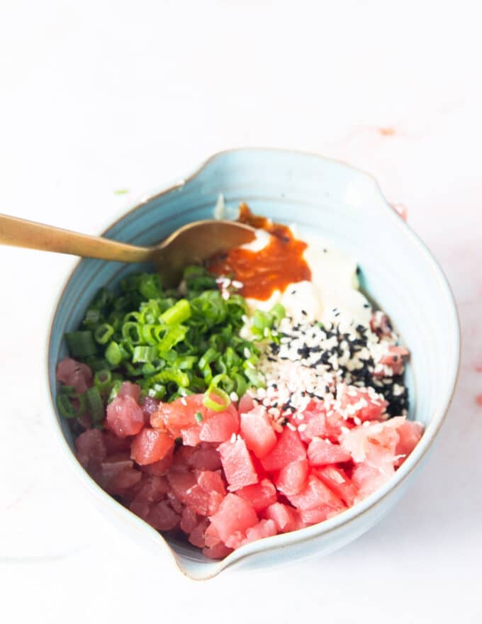 tuna topping ingredients prepared and ready to mix in a bowl