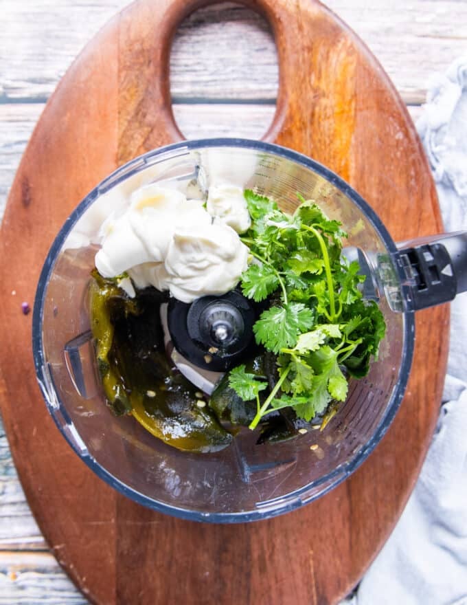 All ingredients for poblano sauce in a blender