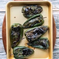 charred poblanos after roasting