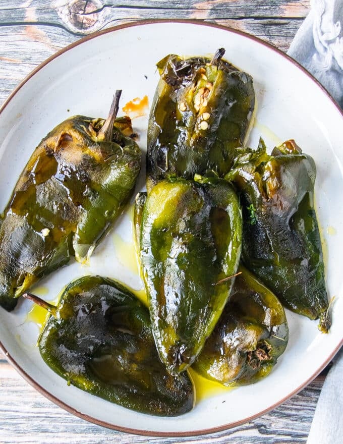 A plate of roasted poblano peppers