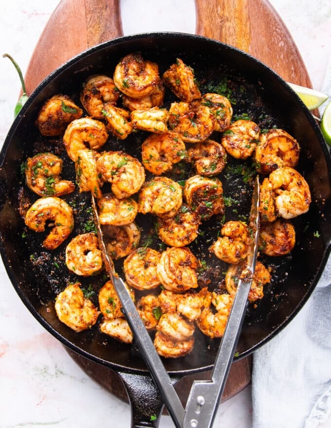 fully cooked shrimp in a skillet ready and charred for the tacos