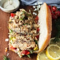 Sardines are added over the the veggies and salad ingredients