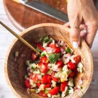 The topping ingredients all mixed together in a bowl and ready to use on the sandwich