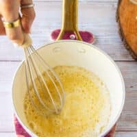 Cooked flour and butter in a sauce pan to make the roux base for the queso dip