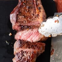 perfectly cooked and sliced picanha steaks close up