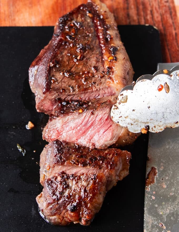 perfectly cooked and sliced picanha steaks close up