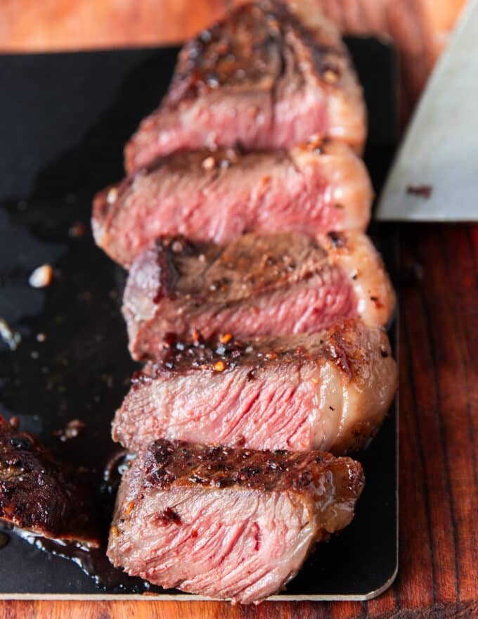 Perfect slices of picanha steak showing how it is sliced against the grain so perfectly 