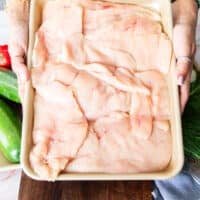 chicken prepared by cutting thinly into two and pounded if needed.