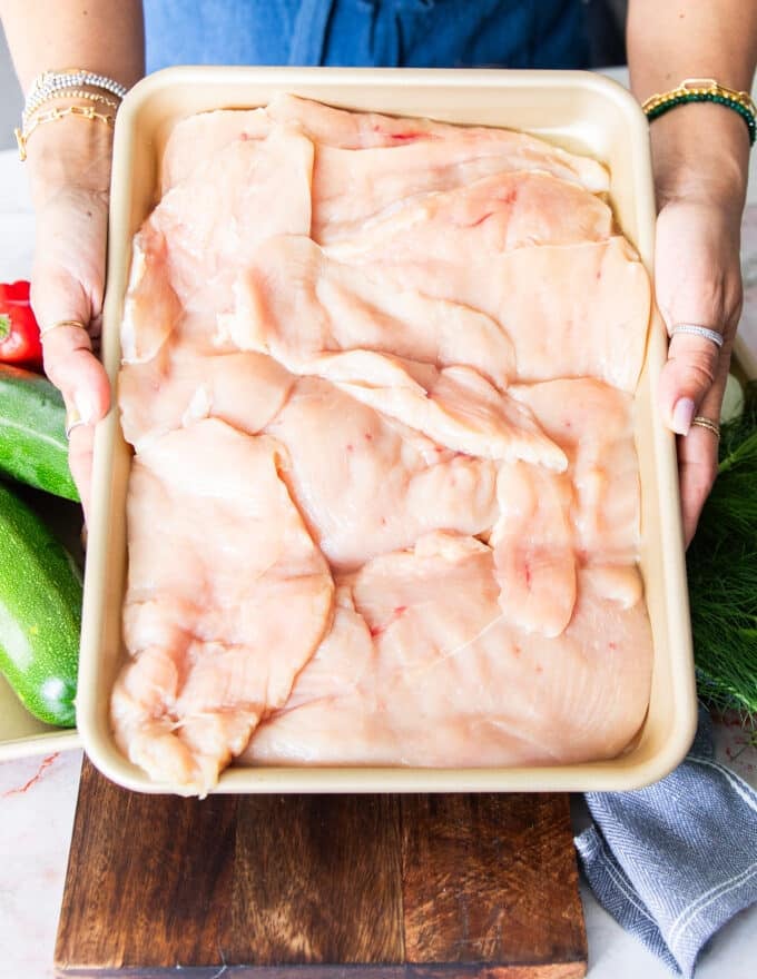 chicken prepared by cutting thinly into two and pounded if needed.